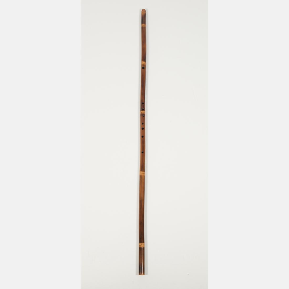 A Carved Bamboo Flute Walking Stick, 20th Century. (1 of 3)