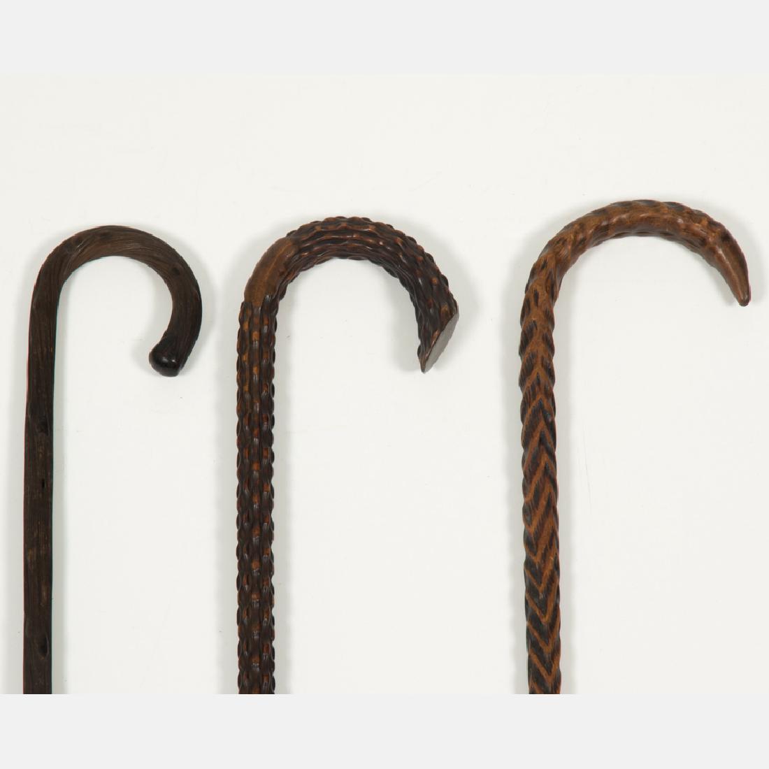 A Group of Three Carved Exotic Wood Canes, 20th (1 of 8)