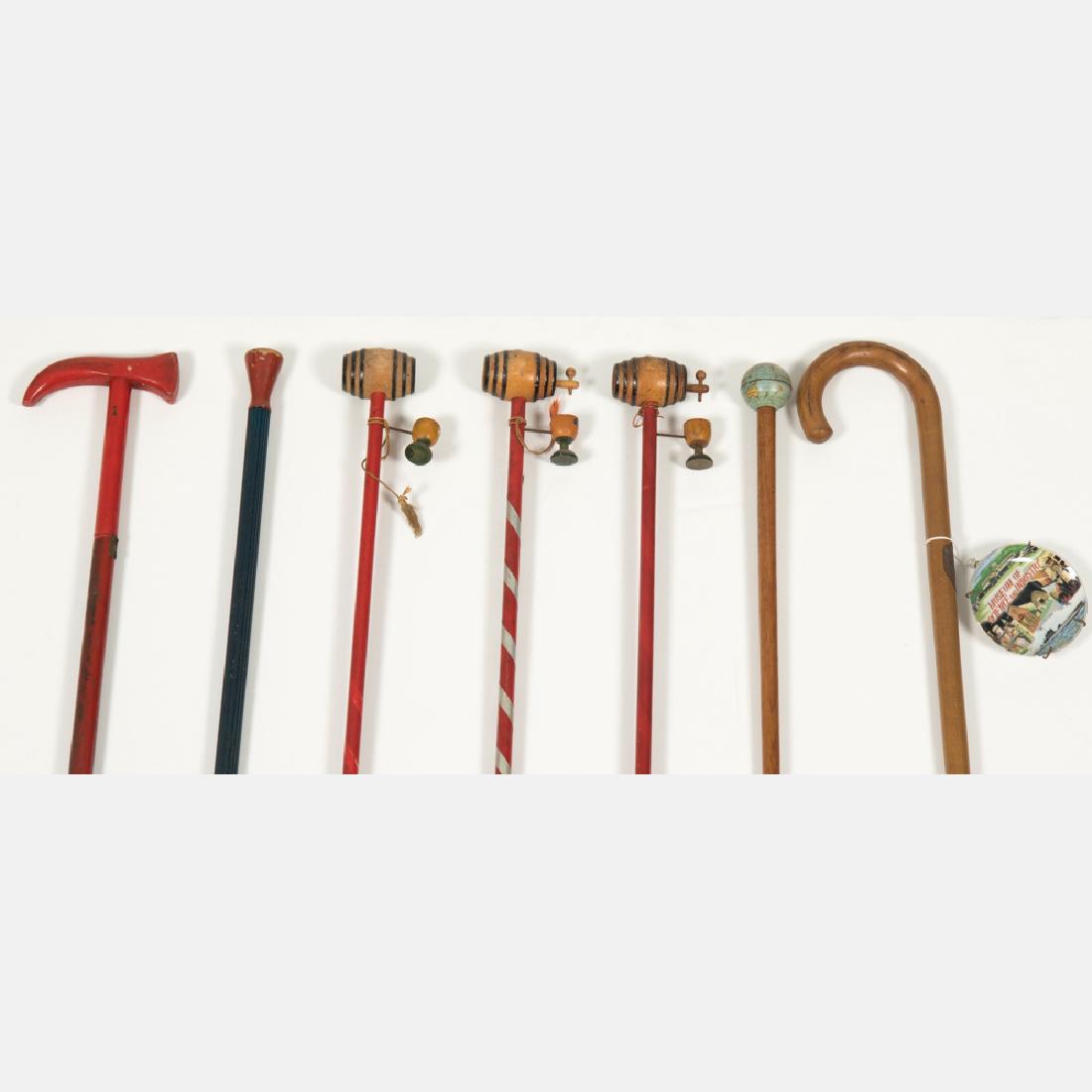 A Group of Seven Painted Hardwood and Metal Souvenir (1 of 20)