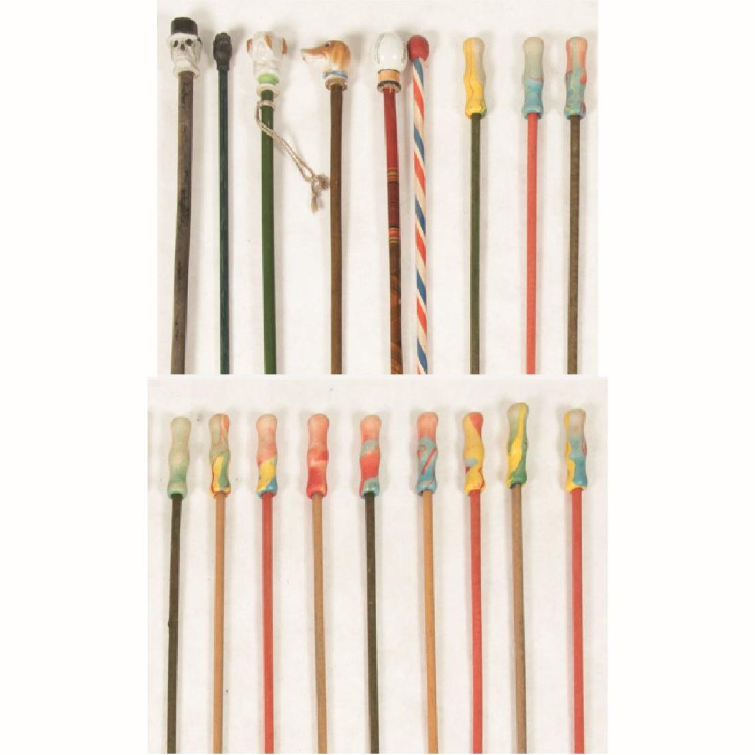 A Collection of Eighteen Painted Wood, Porcelain, (1 of 4)