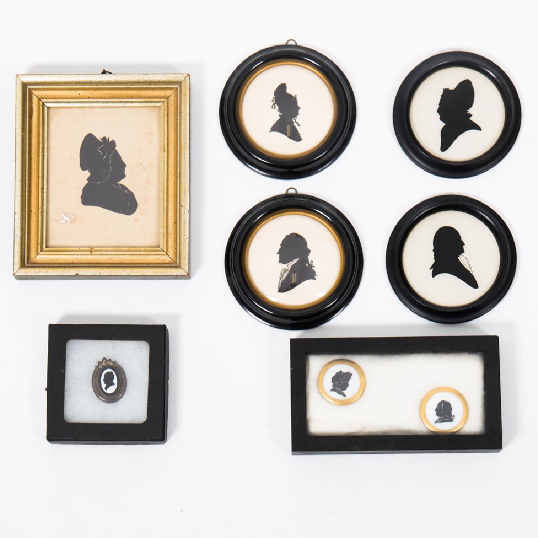 A Collection of Eight Cut Paper, Reverse Painted and (1 of 2)