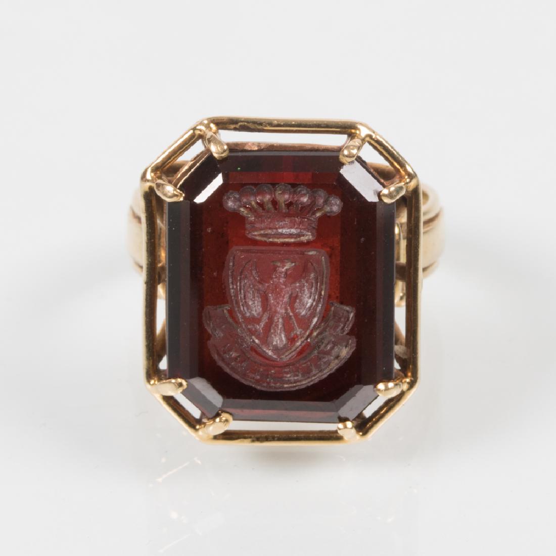 An 18kt. Yellow Gold and Carved Garnet Signet Ring. (1 of 4)