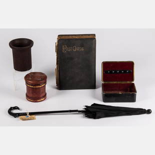 A Miscellaneous Collection of Vintage Decorative Items,: A Miscellaneous Collection of Vintage Decorative Items, 20th Century, Including a tufted leather circular box with lid, a Le Tanneur jewelry box, a leather bound postcard album with postcards, a carri