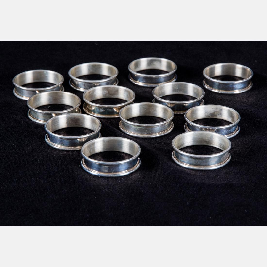 A Set of Twelve Web Sterling Silver Napkins Rings, 20th (1 of 2)