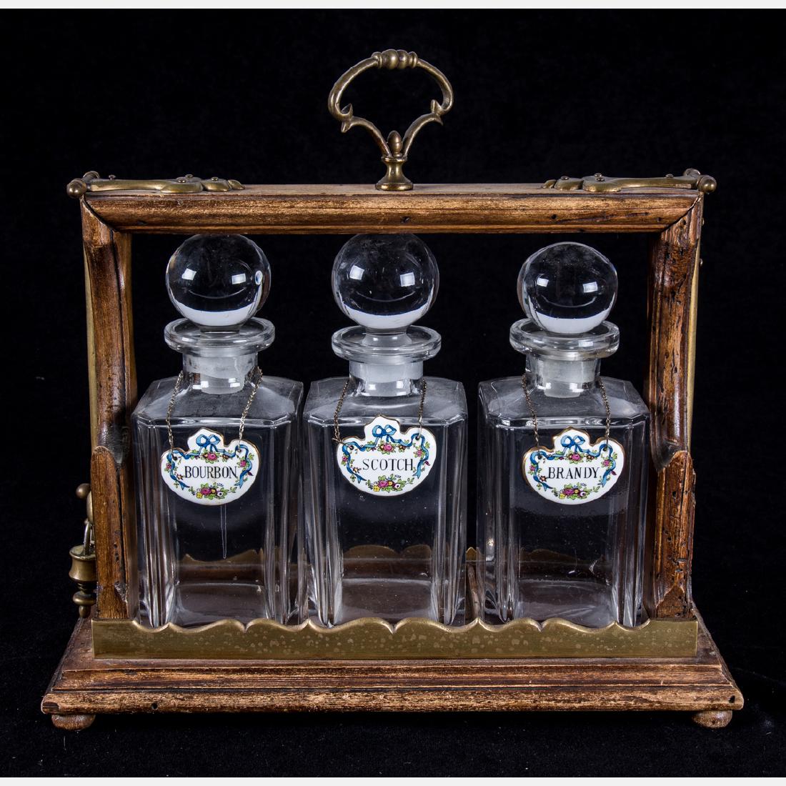 A Georgian Style Mahogany, Brass and Crystal Tantalus, (1 of 3)