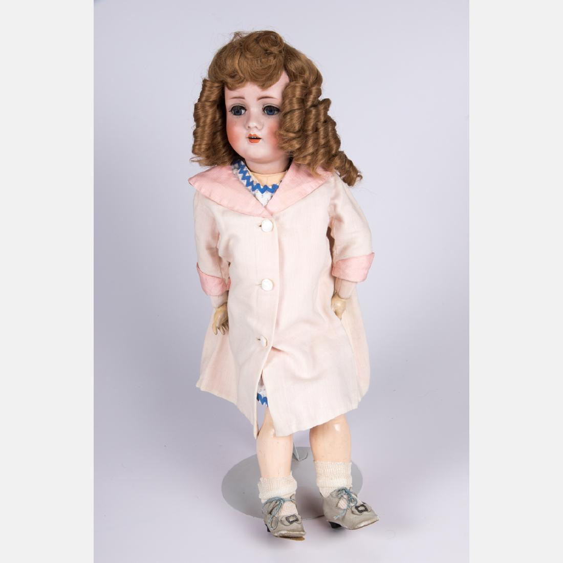 A German Bisque Doll, 20th Century, (1 of 2)