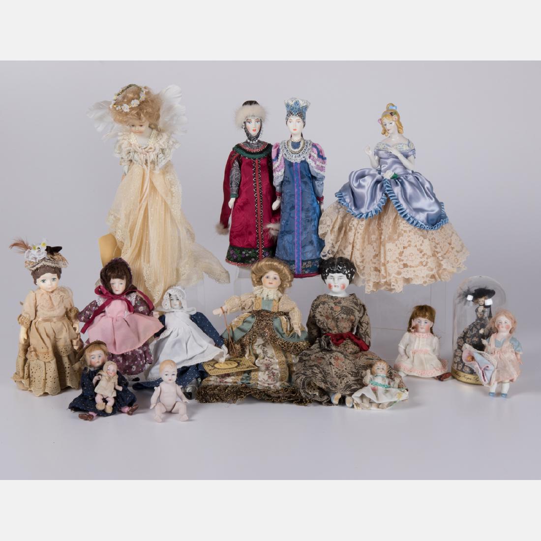 A Miscellaneous Collection of Bisque Dolls by Various: A Miscellaneous Collection of Bisque Dolls by Various Makers, 19th/20th Century, Including dolls by Louis Nichale (Heirloom Collection), Goebel and Kykna Cybehnpha. The Collection of Oliver and Joyce 