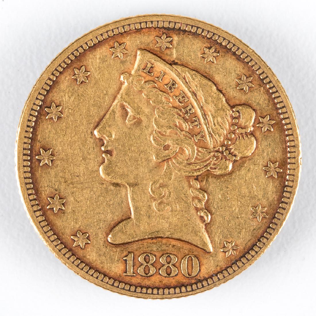An 1880 $5 U.S. Liberty Half Eagle Gold Coin, (1 of 2)