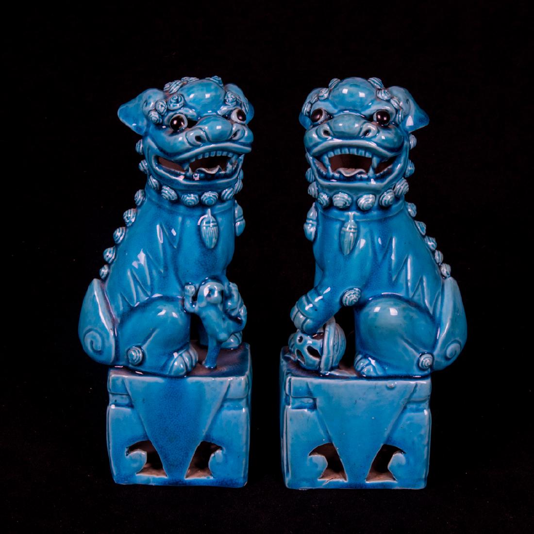 A Pair of Chinese Turquoise Glazed Porcelain Foo Dogs, (1 of 2)