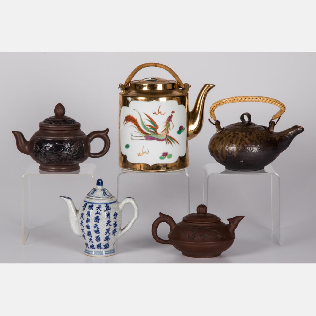 A Group of Five Asian Ceramic Teapots, 20th Century. (1 of 8)