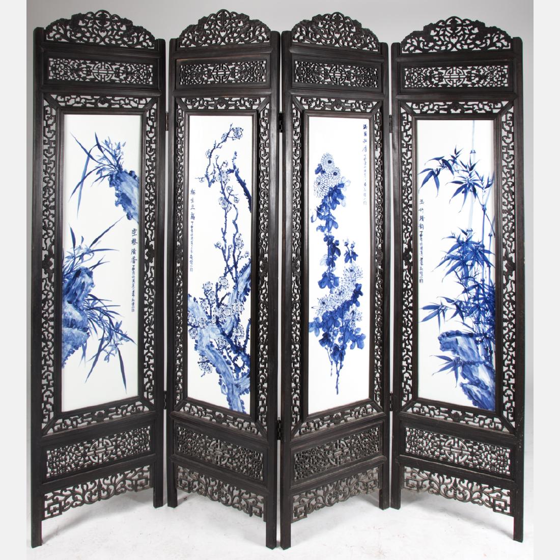 A Chinese Carved Hardwood, Blue and White Porcelain (1 of 4)