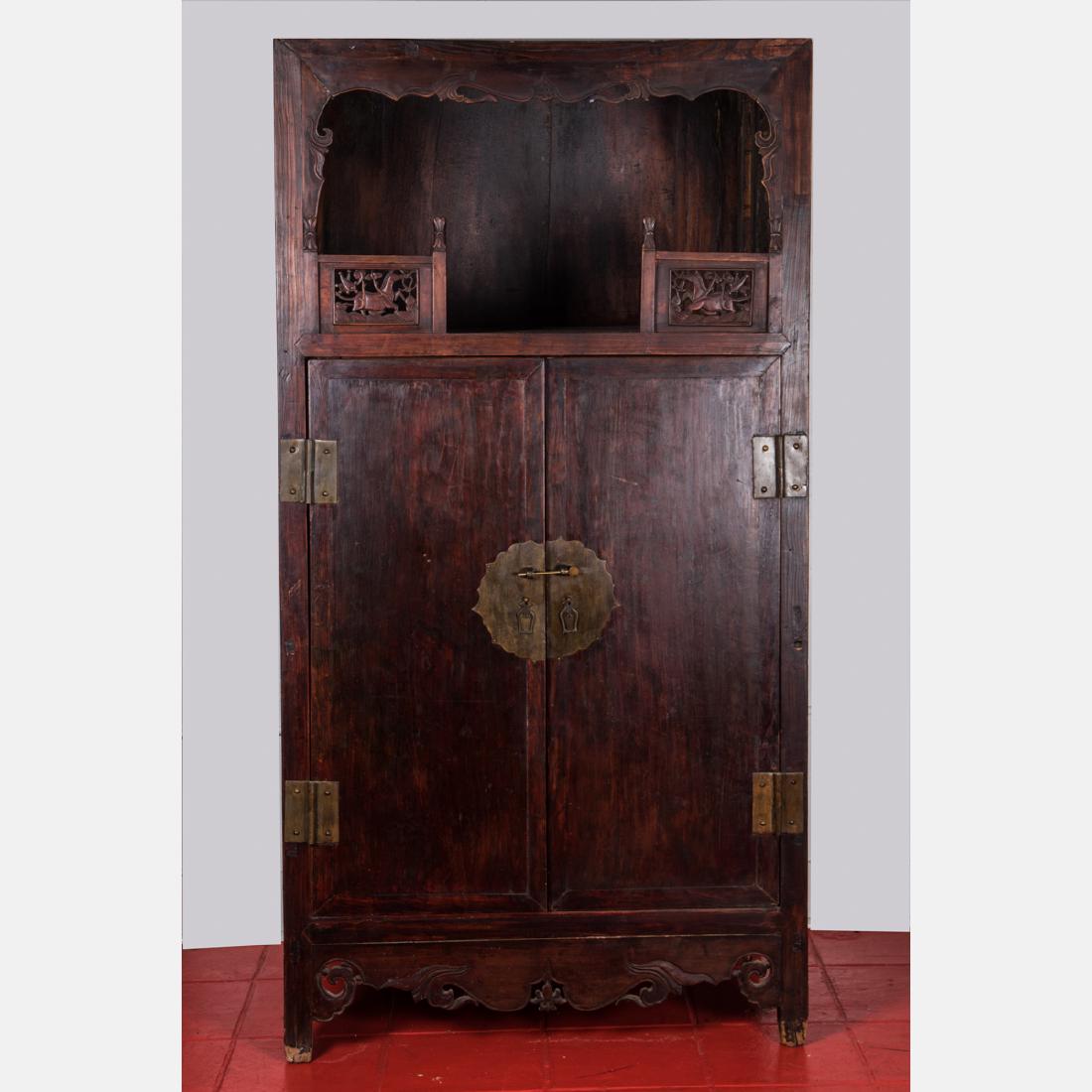 A Chinese Carved and Stained Elm Display Cabinet, (1 of 4)