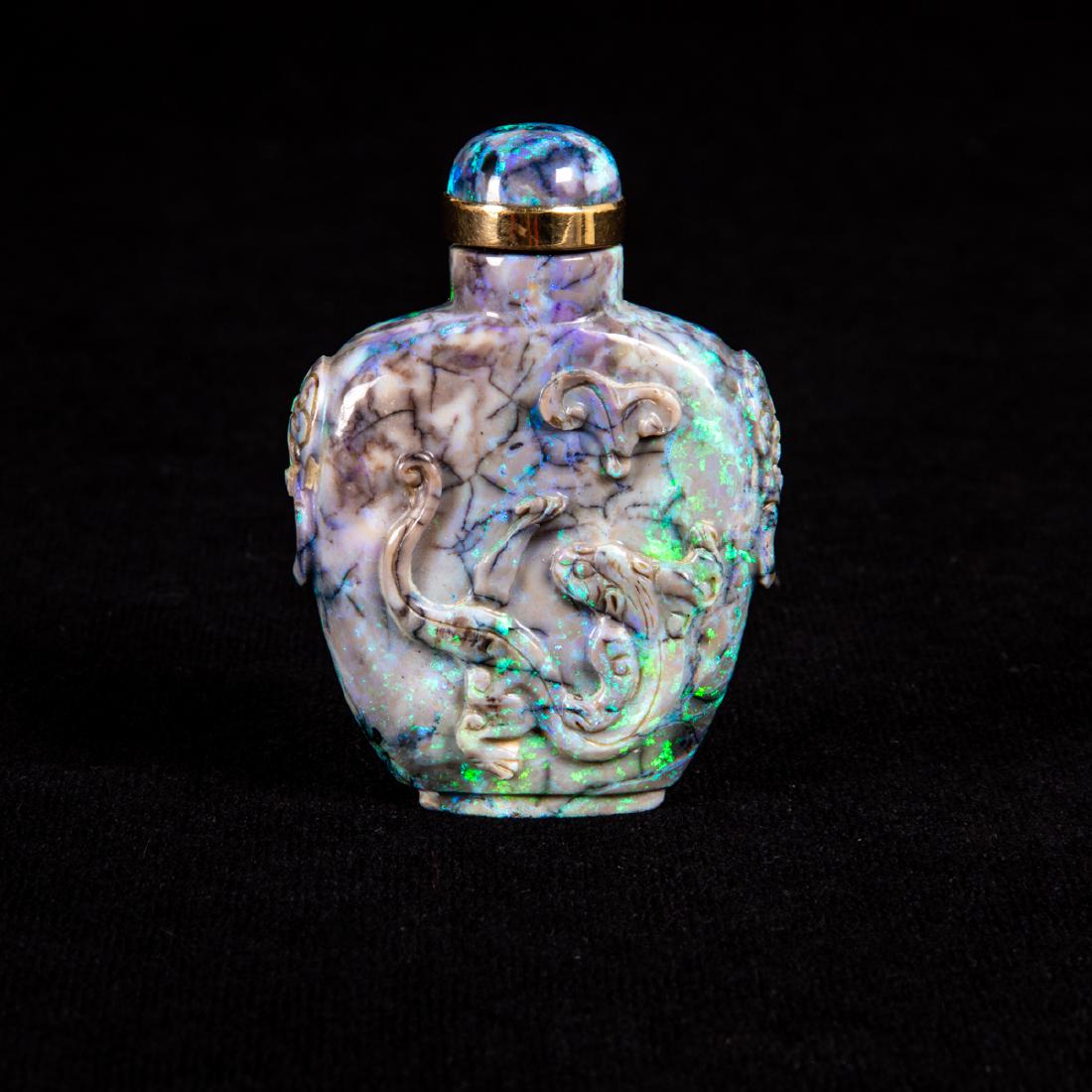 A Chinese Carved Black Opal Snuff Bottle, (1 of 11)