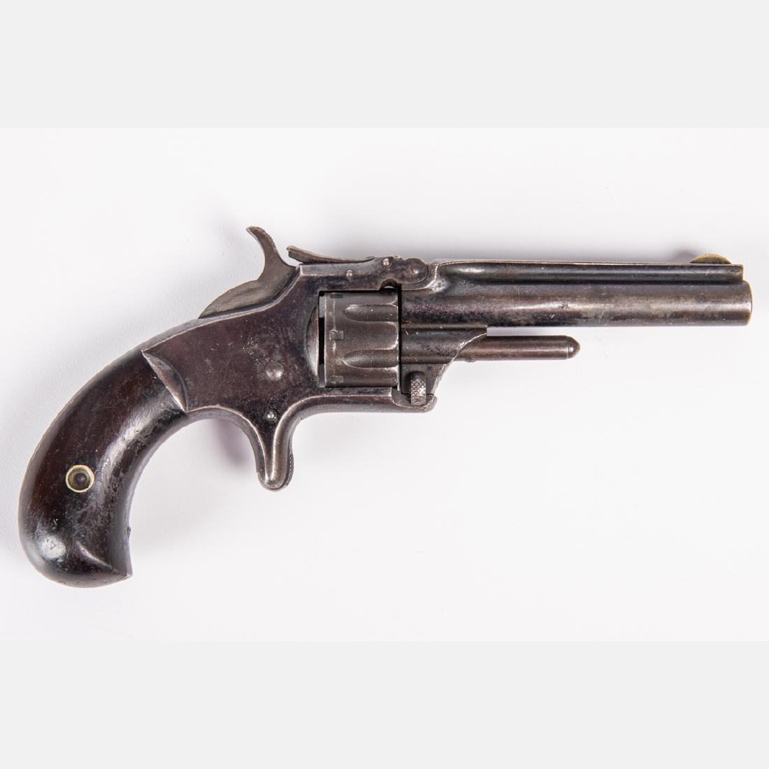 A Smith and Wesson Model #1, 3rd Issue Revolver, 19th: A Smith and Wesson Model #1, 3rd Issue Revolver, 19th Century, Hallmarked on barrel with hardwood grip. Barrel length: 3 in. L: 7 in.