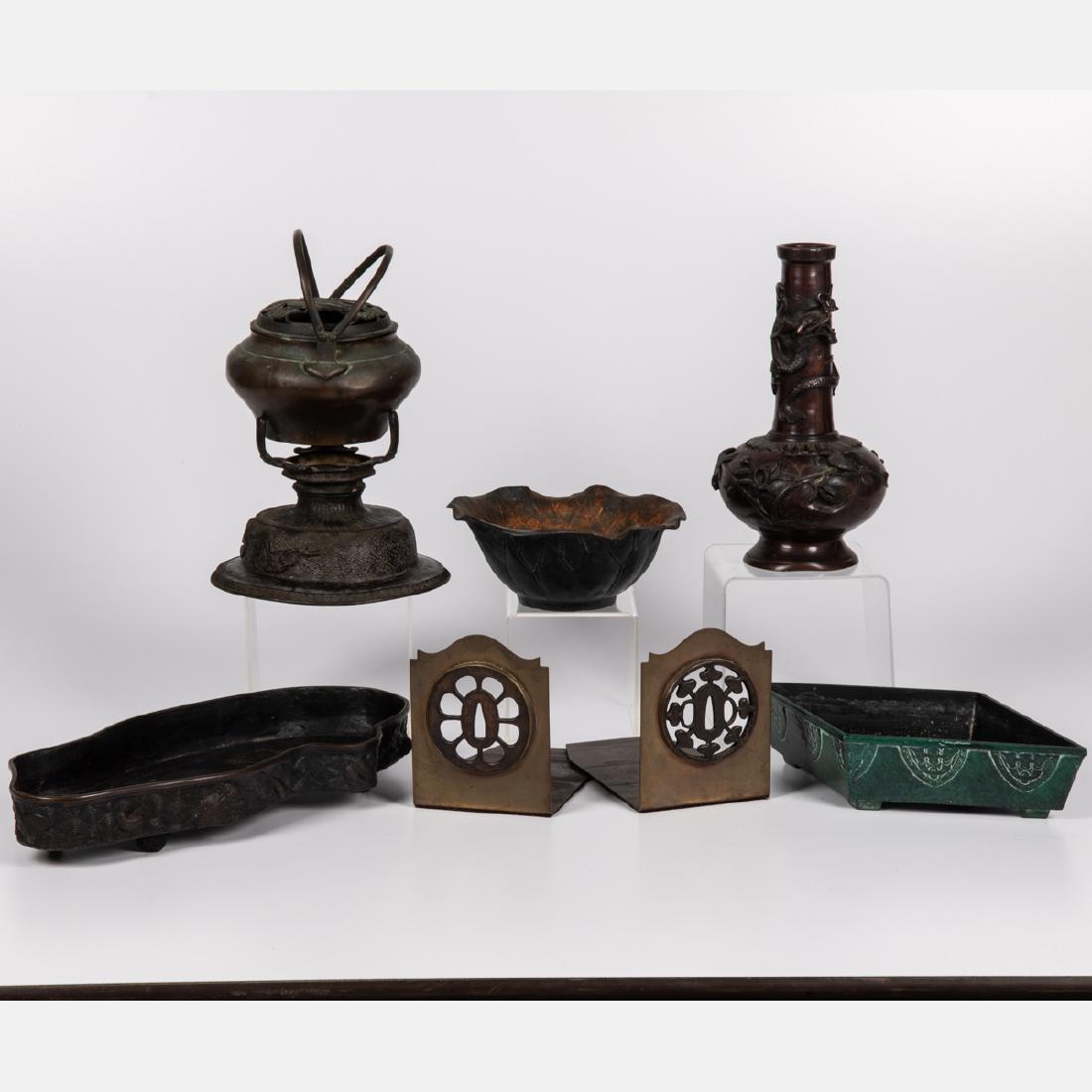 A Collection of Japanese Brass, Bronze and Metal: A Collection of Japanese Brass, Bronze and Metal Ikebana Vases, Censer and Bookends, 19th/20th Century. Largest dimensions: h: 10 in.