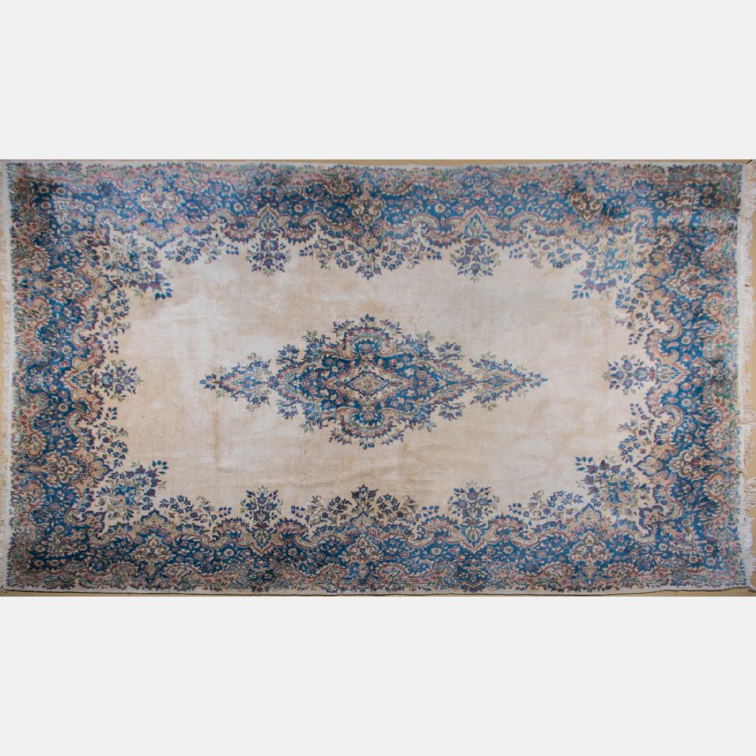 A Kerman Wool Rug, 20th Century, (1 of 3)