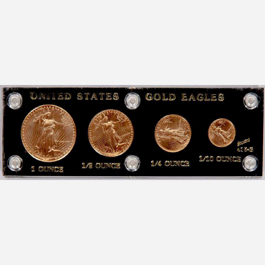 A Group of Four 1986 Gold American Eagle Coins,: A Group of Four 1986 Gold American Eagle Coins, Circulated.