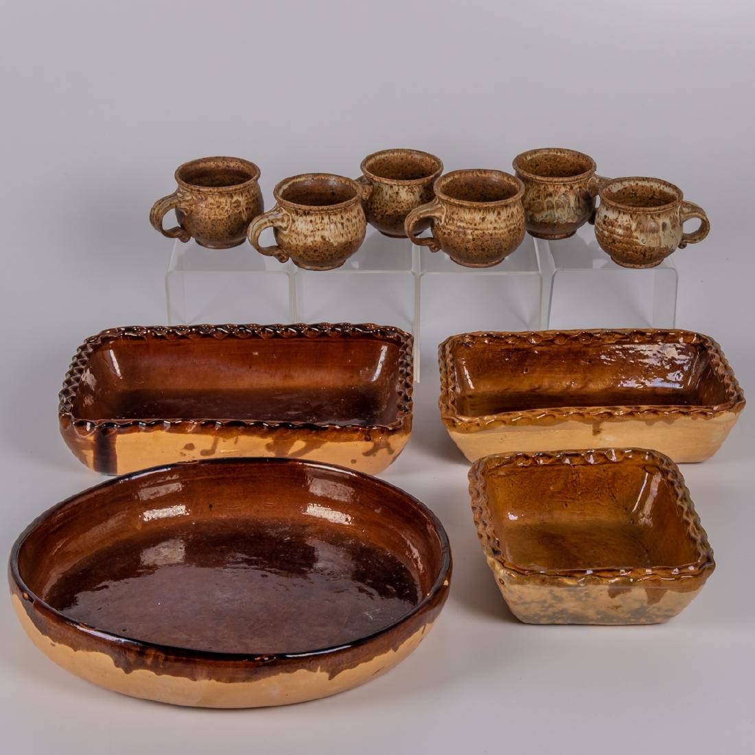 A Collection of Rustic Earthenware Pottery by Various: A Collection of Rustic Earthenware Pottery by Various Makers, 20th Century. Largest dimensions: h: 2 3/4 x dia: 13 3/4 in.