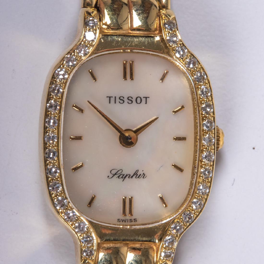 A Tissot 14kt. Yellow Gold and Diamond Wrist Watch,: A Tissot 14kt. Yellow Gold and Diamond Wrist Watch, Set with thirty-four single cut diamond melee with a mother of pearl dial and Swiss quartz movement. Together with Stadler's Jewelry insurance appra