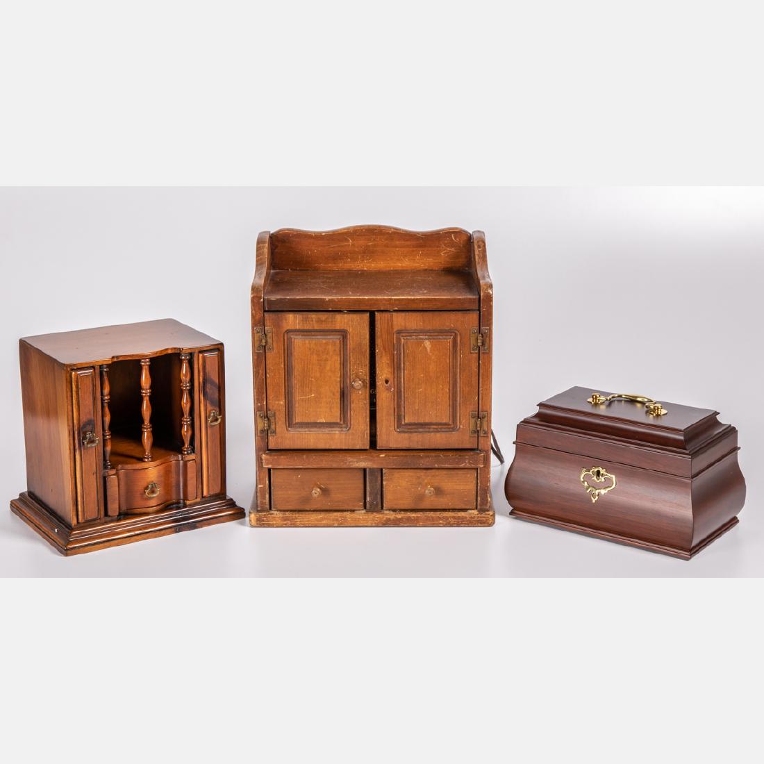 A Vintage Spice Chest Radio Cabinet, 20th Century,: A Vintage Spice Chest Radio Cabinet, 20th Century, Together with two mahogany decorative boxes. Largest dimensions: h: 13 1/2 x w: 11 1/2 x d: 6 1/2 in.