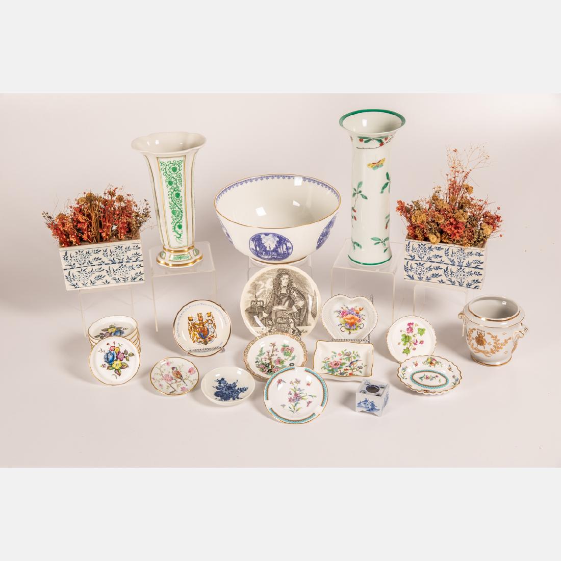 A Miscellaneous Collection of Porcelain Serving and: A Miscellaneous Collection of Porcelain Serving and Decorative Items by Various Makers, 20th Century, Including Delft, Royal Worcester, and Mottahedeh. Largest dimensions: h: 11 1/4 in.