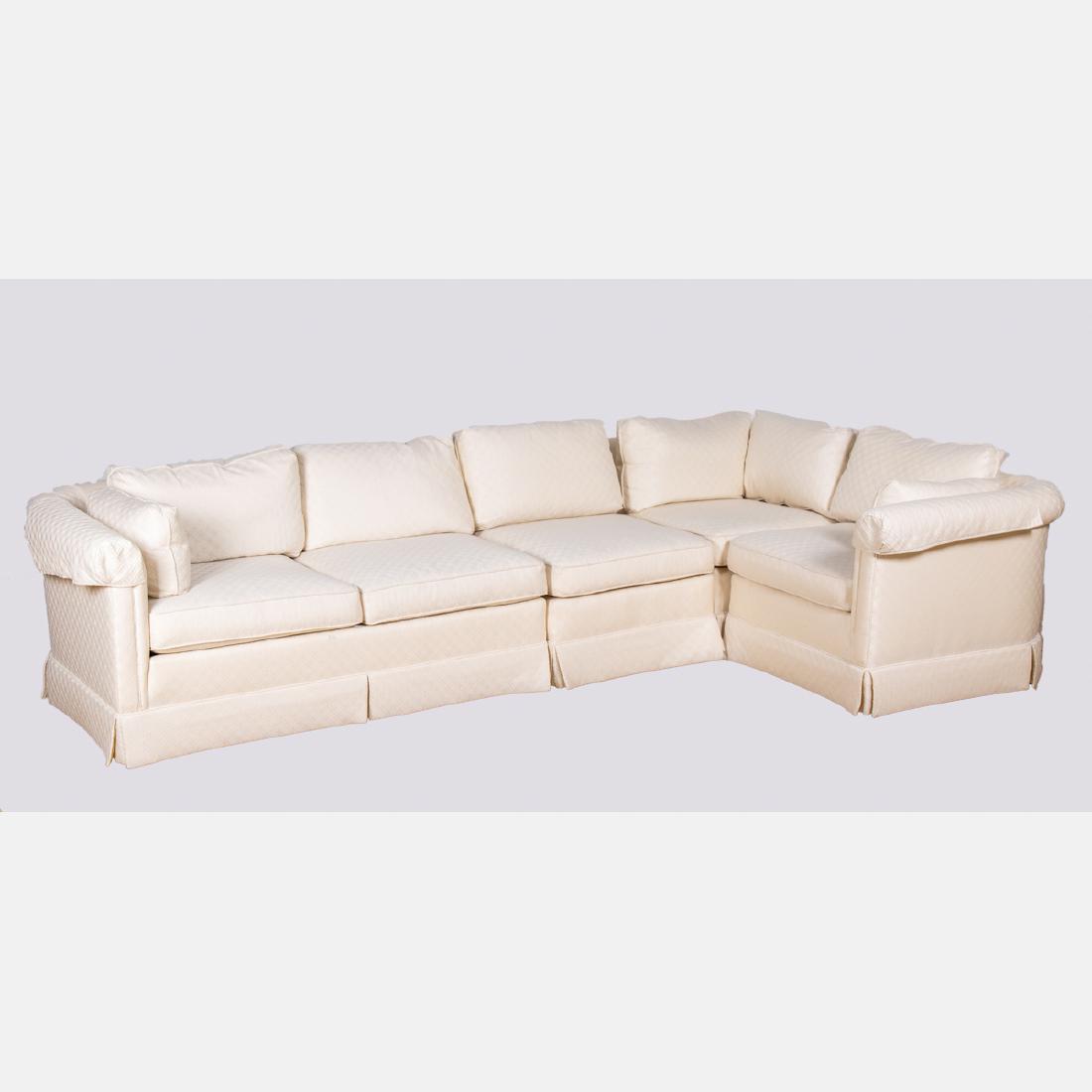 A Baker Furniture White Upholstered Four Part Sectional: A Baker Furniture White Upholstered Four Part Sectional Sofa, 20th Century. Largest section dimensions: h: 27 1/2 x w: 60 x d: 36 in.