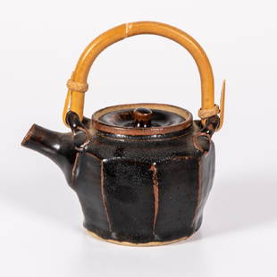 Warren Mackenzie (b. 1924) Teapot, Glazed stoneware: Warren Mackenzie (b. 1924) Teapot, Glazed stoneware with bamboo handle, Unsigned. H: 7 3/4 W: 6 3/4 D: 5 1/8 in. From the collection of George Roby (1936-2017).