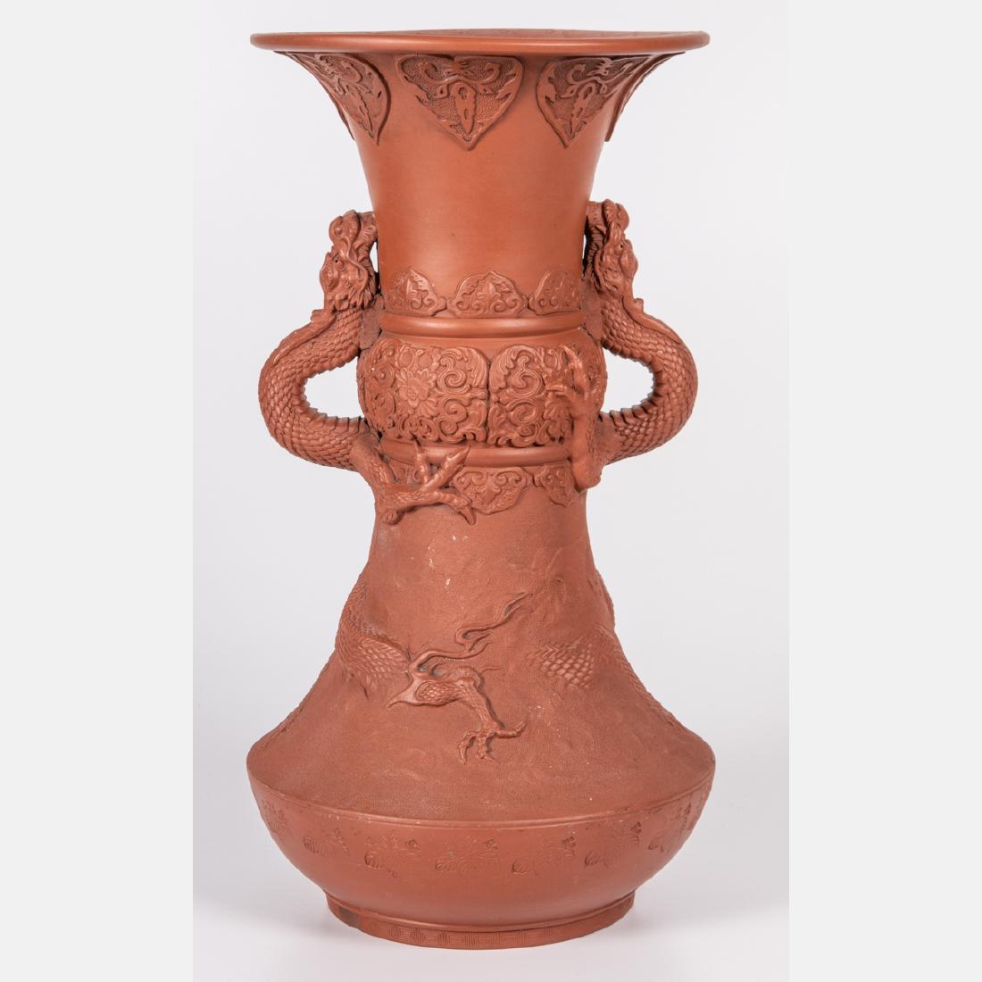 A Japanese Tokoname Redware Vase with Dragon Form: A Japanese Tokoname Redware Vase with Dragon Form Handles and Decoration, 20th Century, Unsigned. H: 18 1/4 D: 9 1/2 in.