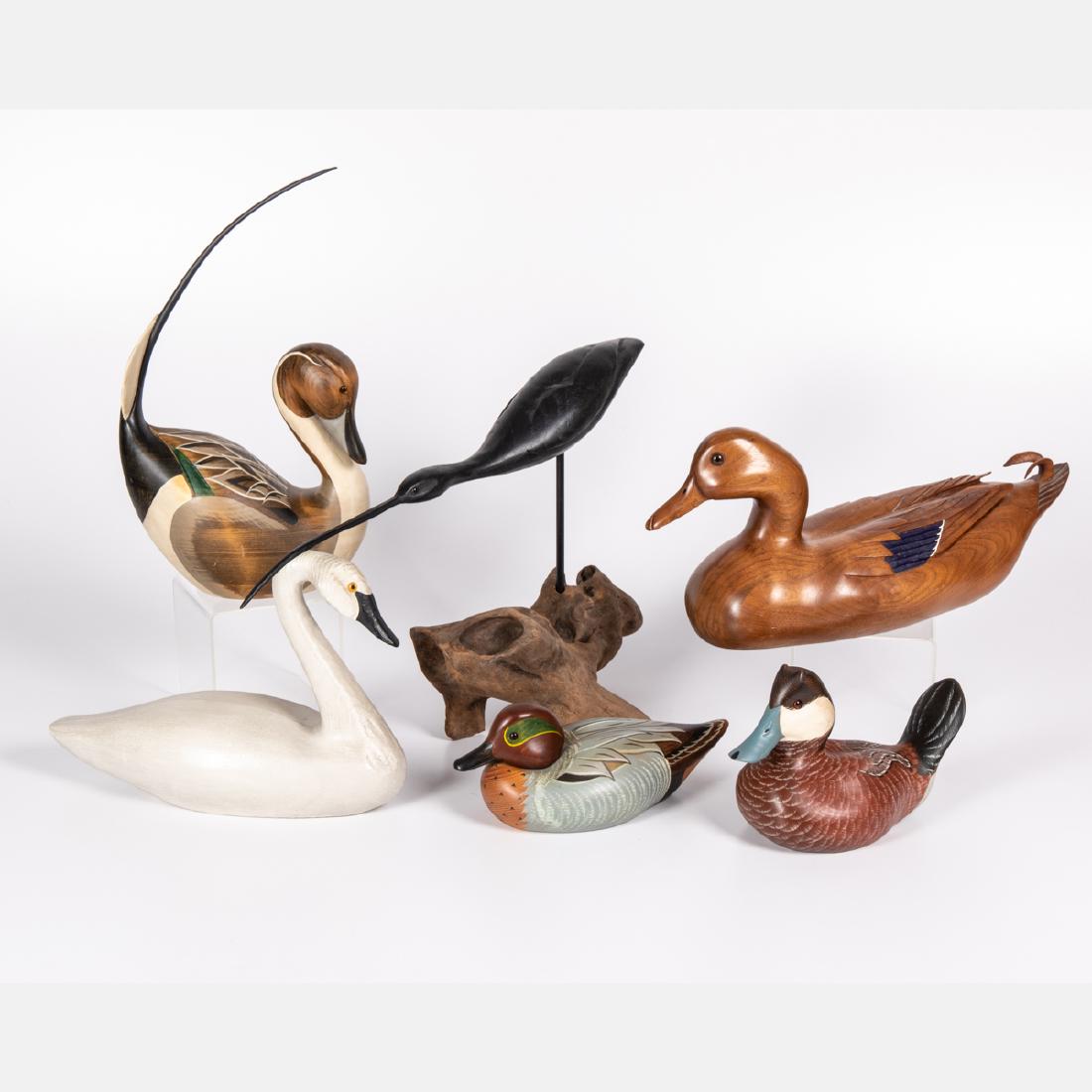 A Group of Six Carved and Painted Hardwood Waterfowl by: A Group of Six Carved and Painted Hardwood Waterfowl by Various Artists, 20th Century, Including pieces by Big Sky Carvers and Ducks Unlimited. Largest dimensions: h: 16 x w: 8 1/2 x d: 4 1/2 in.