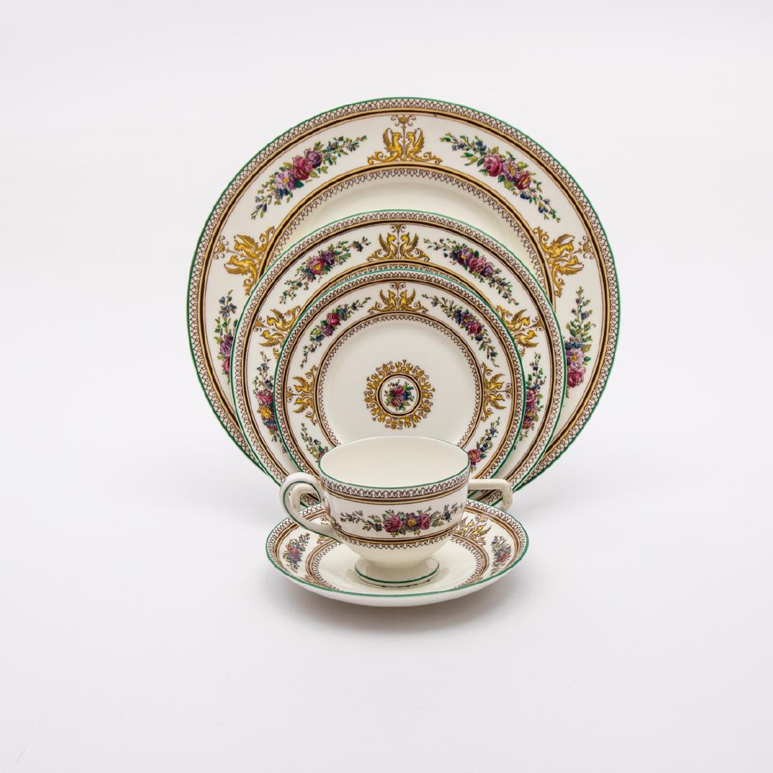 A Wedgwood Polychrome Painted Porcelain Dinner Service: A Wedgwood Polychrome Painted Porcelain Dinner Service in the Columbia Pattern, 20th Century, Comprising of five saucers, six cups, eight dinner plates, eight butter plates and five salad plates.