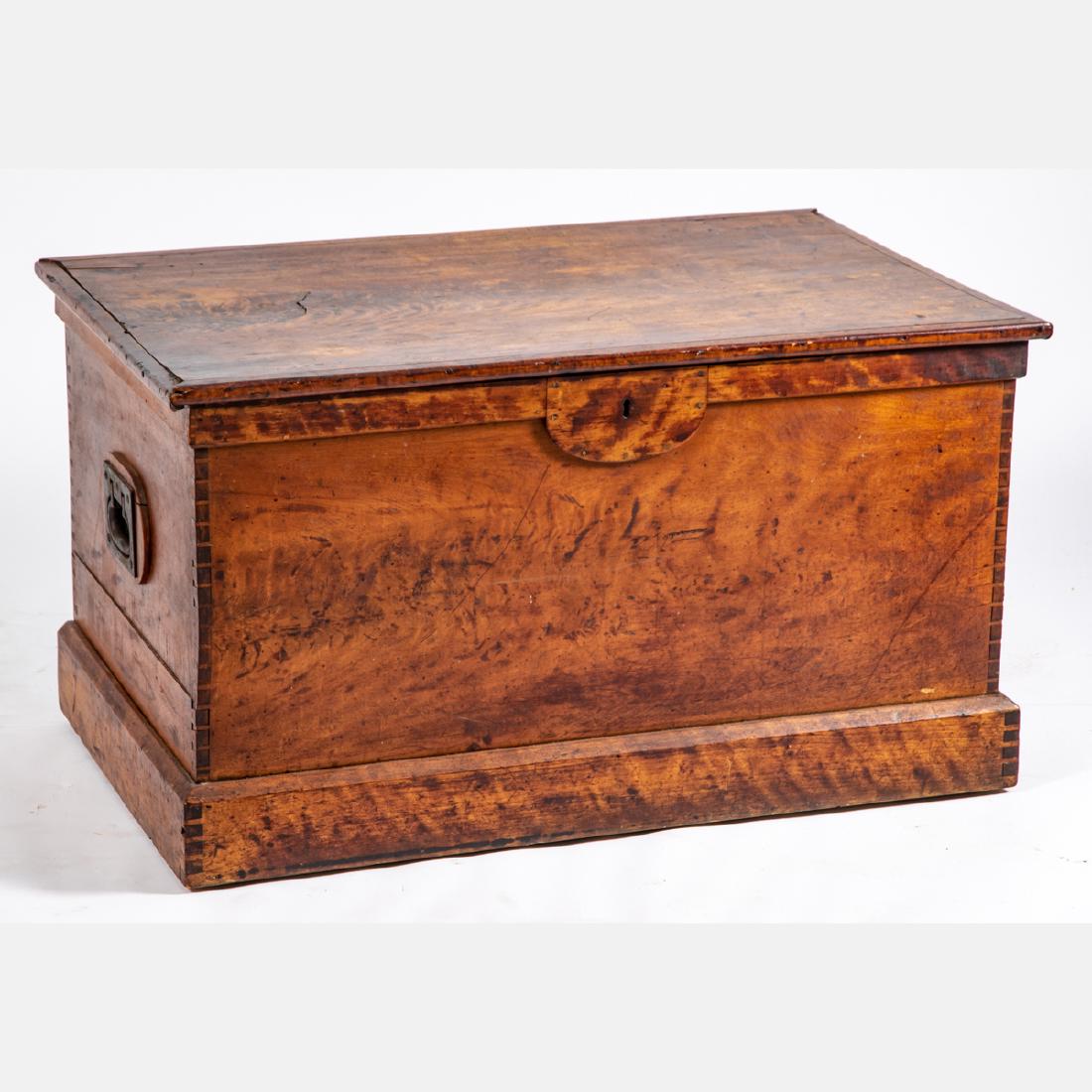 An American Tiger Maple and Pine Trunk, 19th Century.: An American Tiger Maple and Pine Trunk, 19th Century. H: 20 7/8 W: 38 D: 23 in.