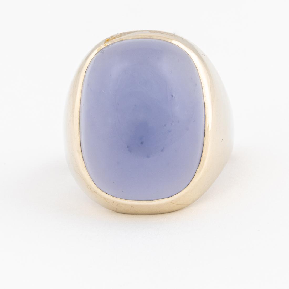 A 14kt. White Gold and Chalcedony Quartz Ring,: A 14kt. White Gold and Chalcedony Quartz Ring, Set with one cabochon cut chalcedony quartz, approx. 19.70mm. x 15 mm. Marked 14k. Ring size: 8. Total approx. weight: 11.3 dwt. Please note no credit ca