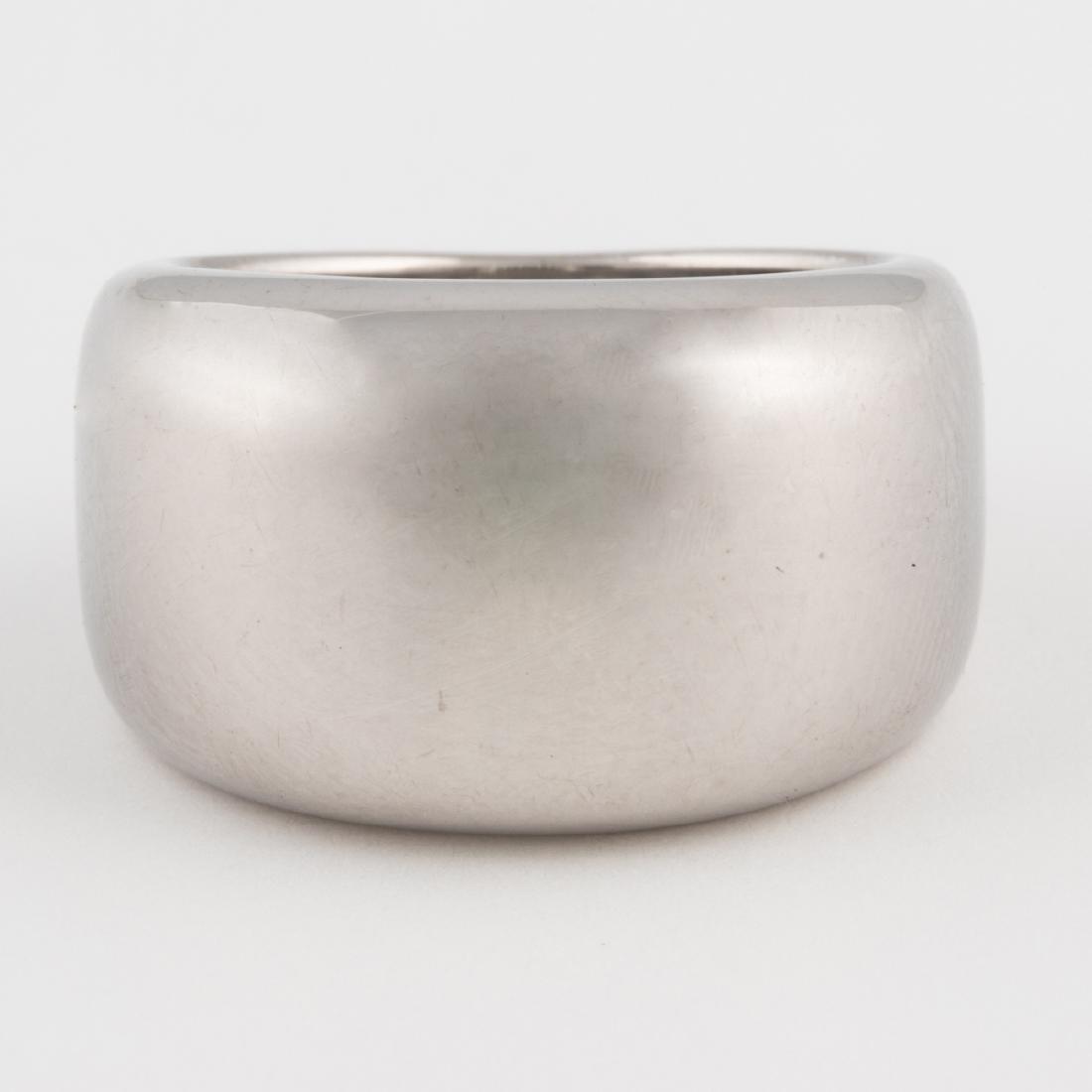 A Cartier 18kt. White Gold Ring, ca. 1997,: A Cartier 18kt. White Gold Ring, ca. 1997, With certificate #31635. Ring size: 7. Total approx. weight: 9 dwt. Please note no credit card payments for first time buyers and seven business day hold on