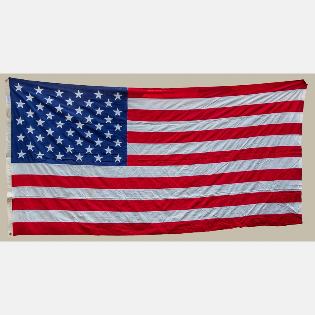 A Vintage 50-Star United States Cotton Display Flag,: A Vintage 50-Star United States Cotton Display Flag, 20th Century, Made by the Valley Forge Flag Co. Dimensions: 5 ft. 8 in. x 9 ft. 8 in.