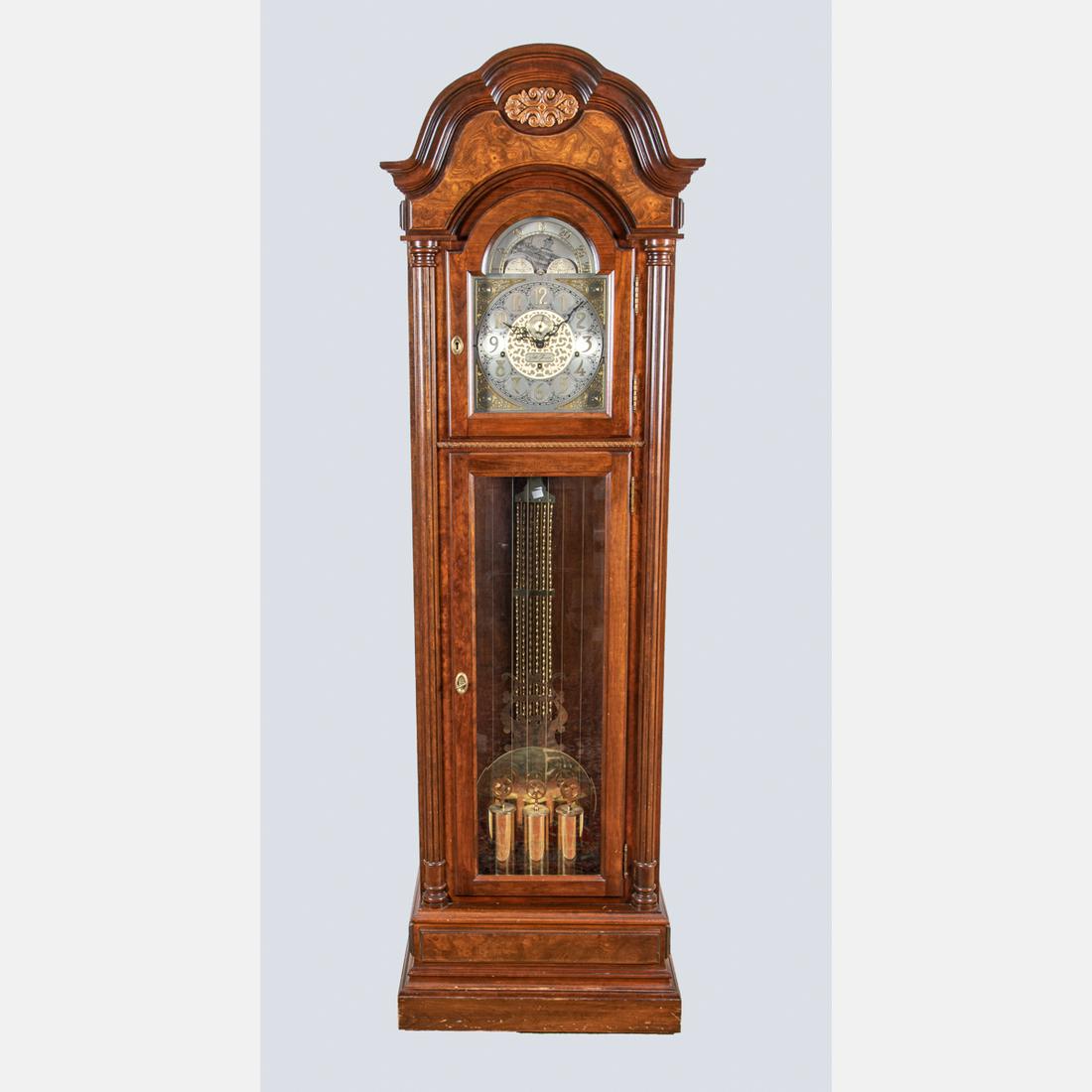 A Seth Thomas Mahogany Tall Case Clock, 20th Century.: A Seth Thomas Mahogany Tall Case Clock, 20th Century. H: 80 1/2 W: 24 3/8 D: 14 5/8 in.
