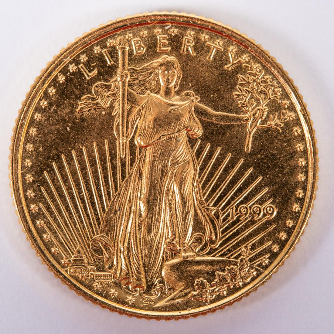 A 1999 Gold Liberty American Eagle 1/10 Ounce $5.00: A 1999 Gold Liberty American Eagle 1/10 Ounce $5.00 Coin, Having Saint-Gaudens Lady Liberty with Soaring Eagles and on reverse 22kt. gold with 1/10 ozt. of pure gold. US coin. Please note no credit ca