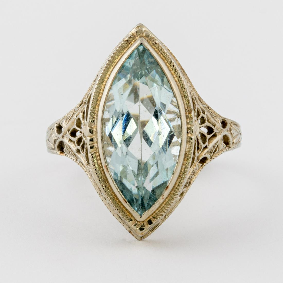 An 18kt. White Gold and Aquamarine Ring.: An 18kt. White Gold and Aquamarine Ring. Ring size: 6 1/4. Total approx. weight: 1.6 dwt. Please note no credit card payments for first time buyers and seven business day hold on all checks.