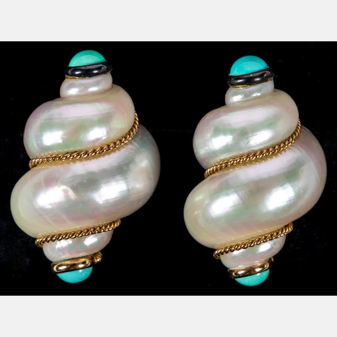 A Pair of 14kt. Yellow Gold and Mabe Pearl Clip-on: A Pair of 14kt. Yellow Gold and Mabe Pearl Clip-on Earrings by M. Mondas. Approximate length: 3 cm. each Approximate weight: 2 oz. each Please note no credit card payments for first time buyers and se