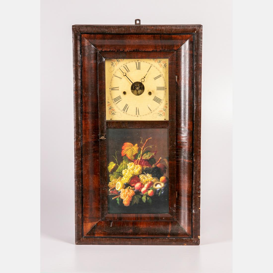 A J.C. Brown Rosewood Veneer Double Ogee Eight Day: A J.C. Brown Rosewood Veneer Double Ogee Eight Day Clock, 20th Century, Not in working order. H: 29 W: 16 3/4 D: 4 1/4 in.