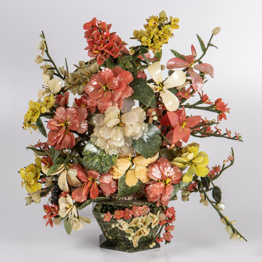 A Chinese Carved Flowering Tree Bouquet: A Chinese Carved Colored Soapstone, Glass and Hard Stone Flowering Tree Bouquet, 20th Century. H: 28 W: 31 D: 22 in.