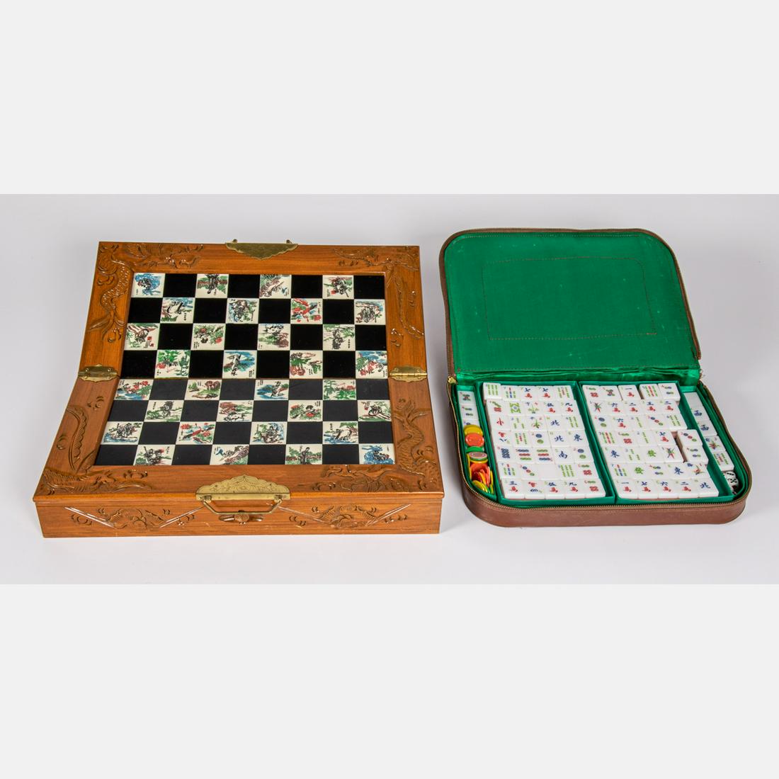 A Chinese Cast Resin Chess Set,: A Chinese Cast Resin Chess Set, 20th Century, Together with a mahjong set. Largest dimensions: h: 5 1/2 x w: 9 x d: 18 in.