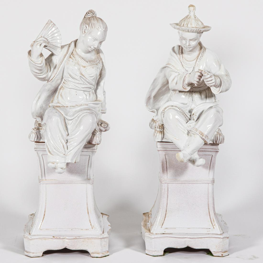A Pair of Glazed Terracotta Mottahedeh Figures on: A Pair of Glazed Terracotta Mottahedeh Chinese Figures on Stands, 20th Century. Largest dimensions: h: 40 x w: 12 x d: 18 in.