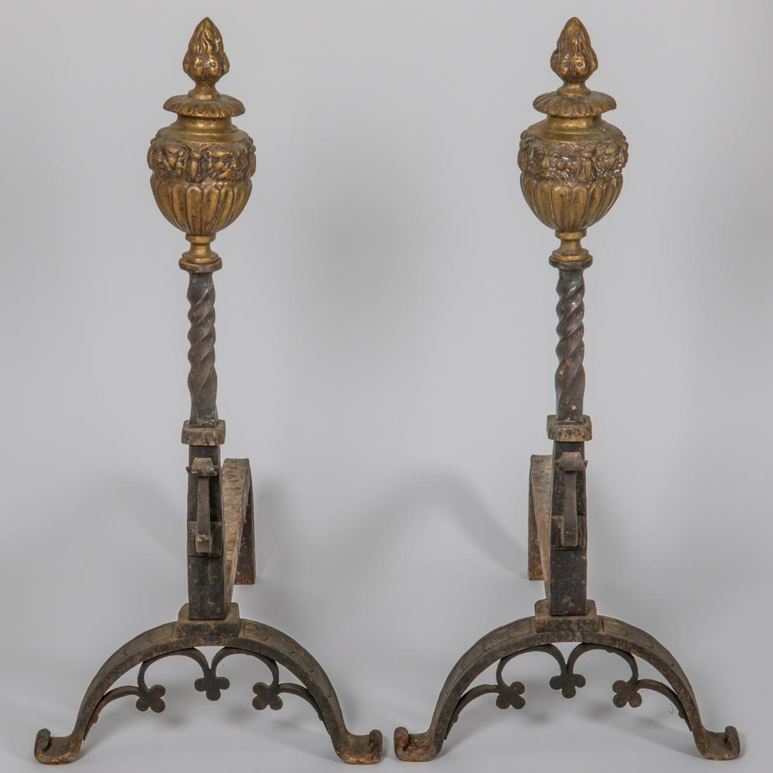 A Pair of Bronze and Wrought Metal Andirons,: A Pair of Elizabethan Style Bronze and Wrought Metal Andirons, 19th Century. H: 32 W: 24 D: 14 1/2 in.
