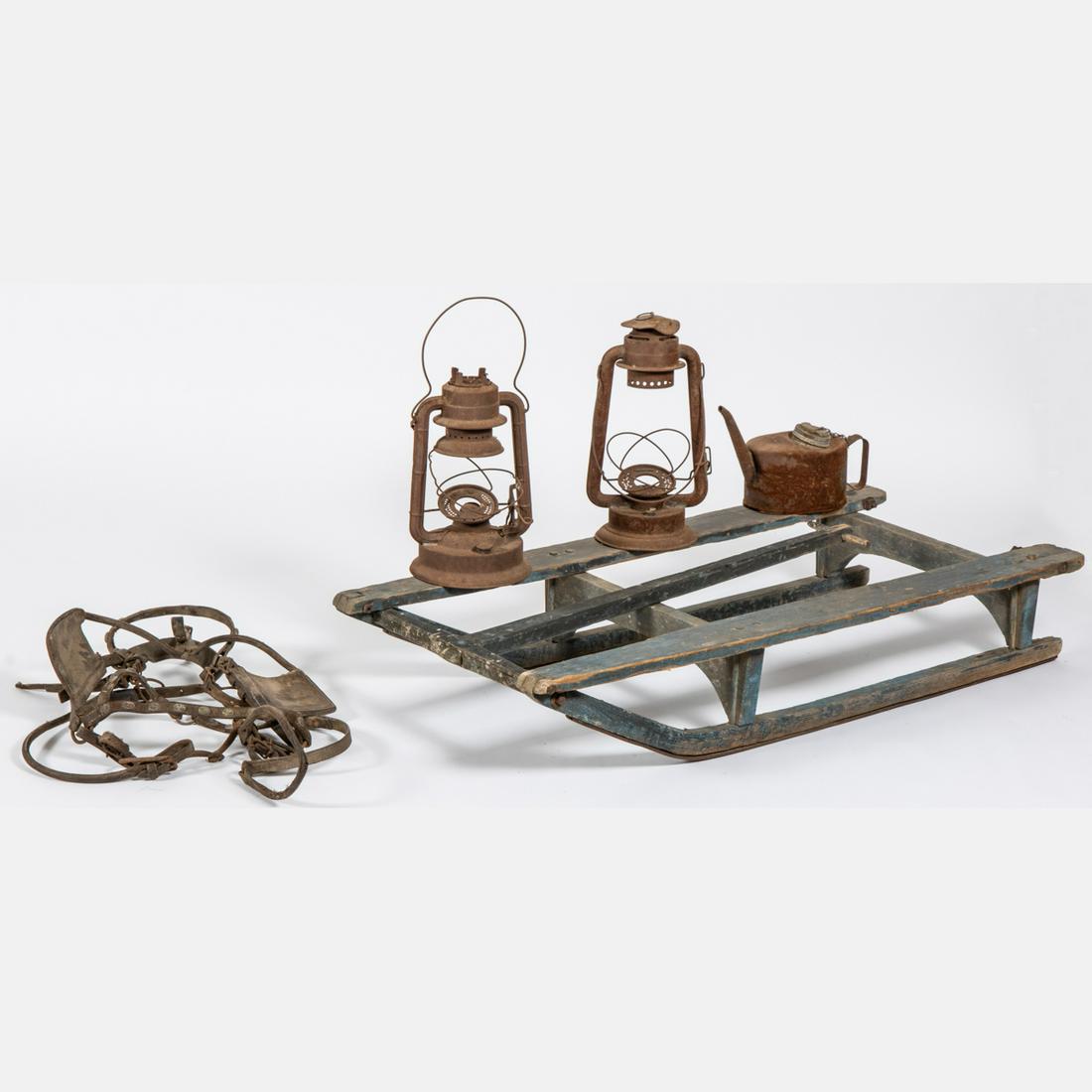 A Collection of Antique Items,: A Miscellaneous Collection of Antique American Farming Lanterns, Sled, Leather Harness and Oil Can,19th/20th Century. Largest dimensions: h: 45 x w: 21 x d: 8 in. From the Cedar Point Collection with