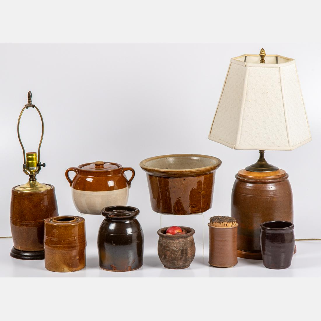 A Miscellaneous Collection of Ceramic and Earthenware: A Miscellaneous Collection of Ceramic and Earthenware Pickling Crocks and Storage Jars, 20th century. Two mounted as lamps. Largest dimensions: H: 23 1/2 x W: 11 1/2 in.