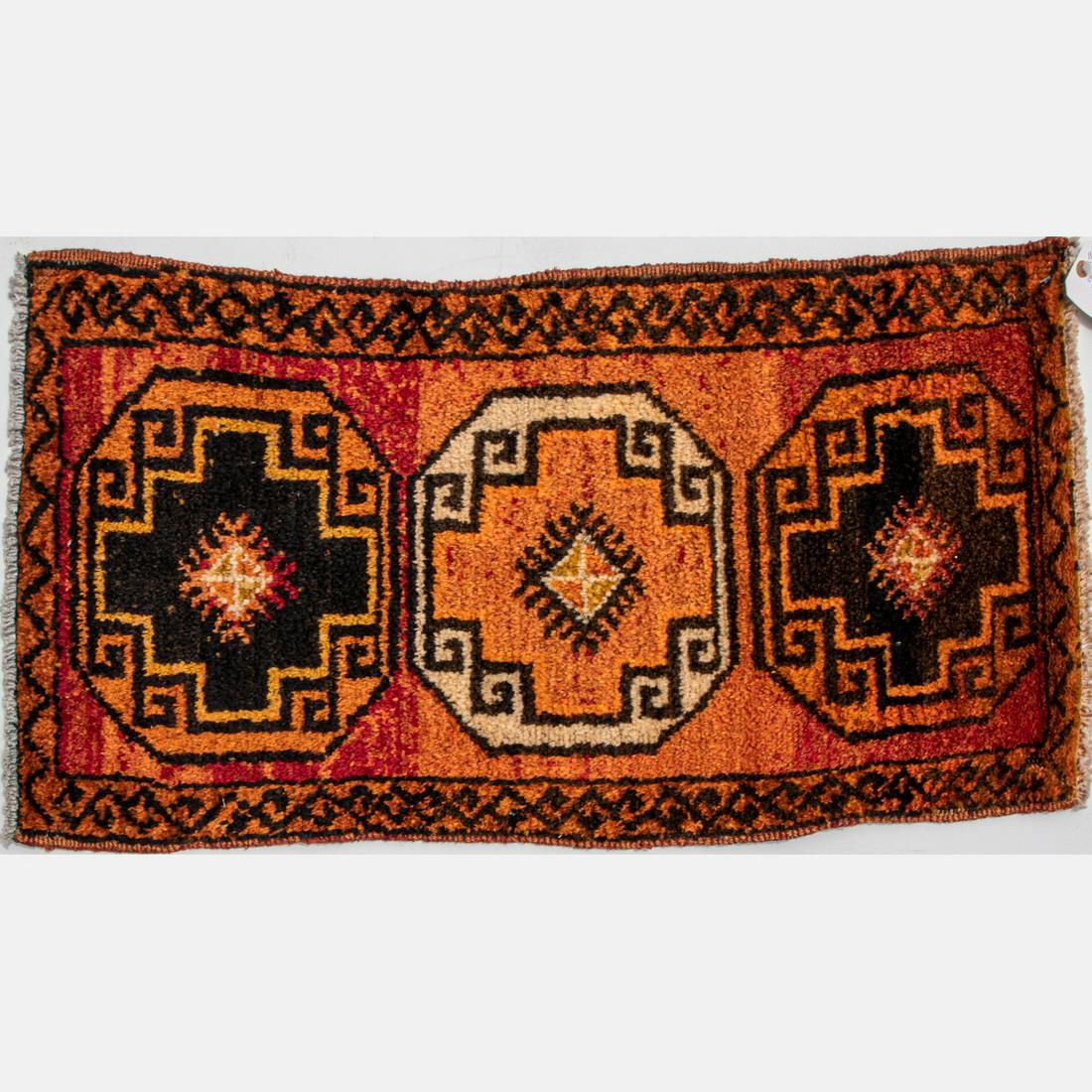 An Antique Turkish Village Wool Rug, Early 20th: An Antique Turkish Village Wool Rug, Early 20th Century. Dimensions: 3 ft. 5 in. x 1 ft. 9 in.