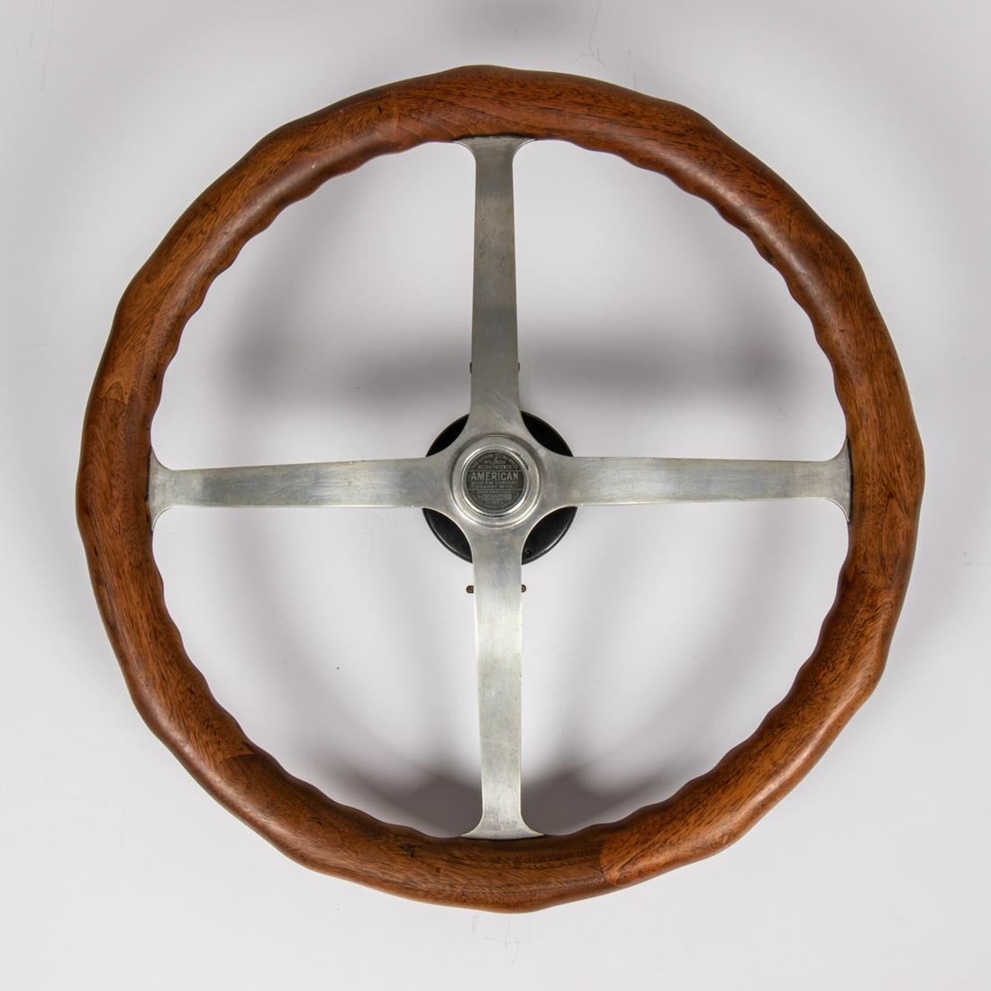 An American Wood Rim Company Ford Locking-Tilting: A 17 1/4 in. Diameter American Wood Rim Company Ford Locking-Tilting Mahogany and Aluminum Steering Wheel, Early 20th Century.Serial no.: B 17502 Diameter of grip: 1 1/2 in.H: 4 1/2 D: 17 1/4 in.
