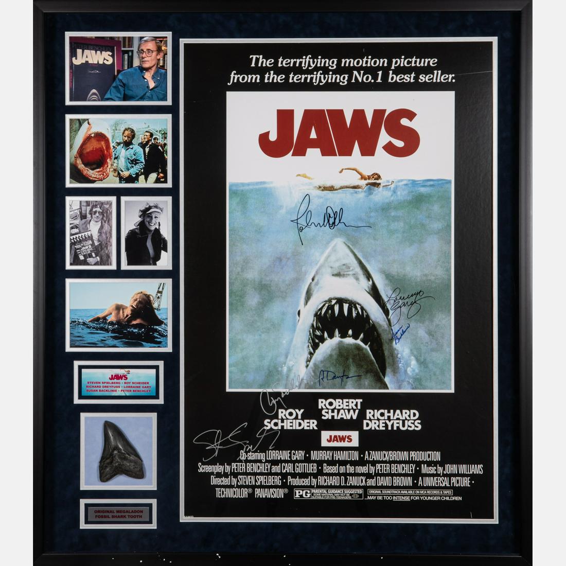 A Jaws Autographed Movie Poster: A Jaws Movie Poster, Autographed by Steven Spielberg, Roy Scheider, Richard Dreyfuss, Lorraine Gary, Susan Backlinie and John Williams,Framed together with five cast images, a silver nameplate and a m