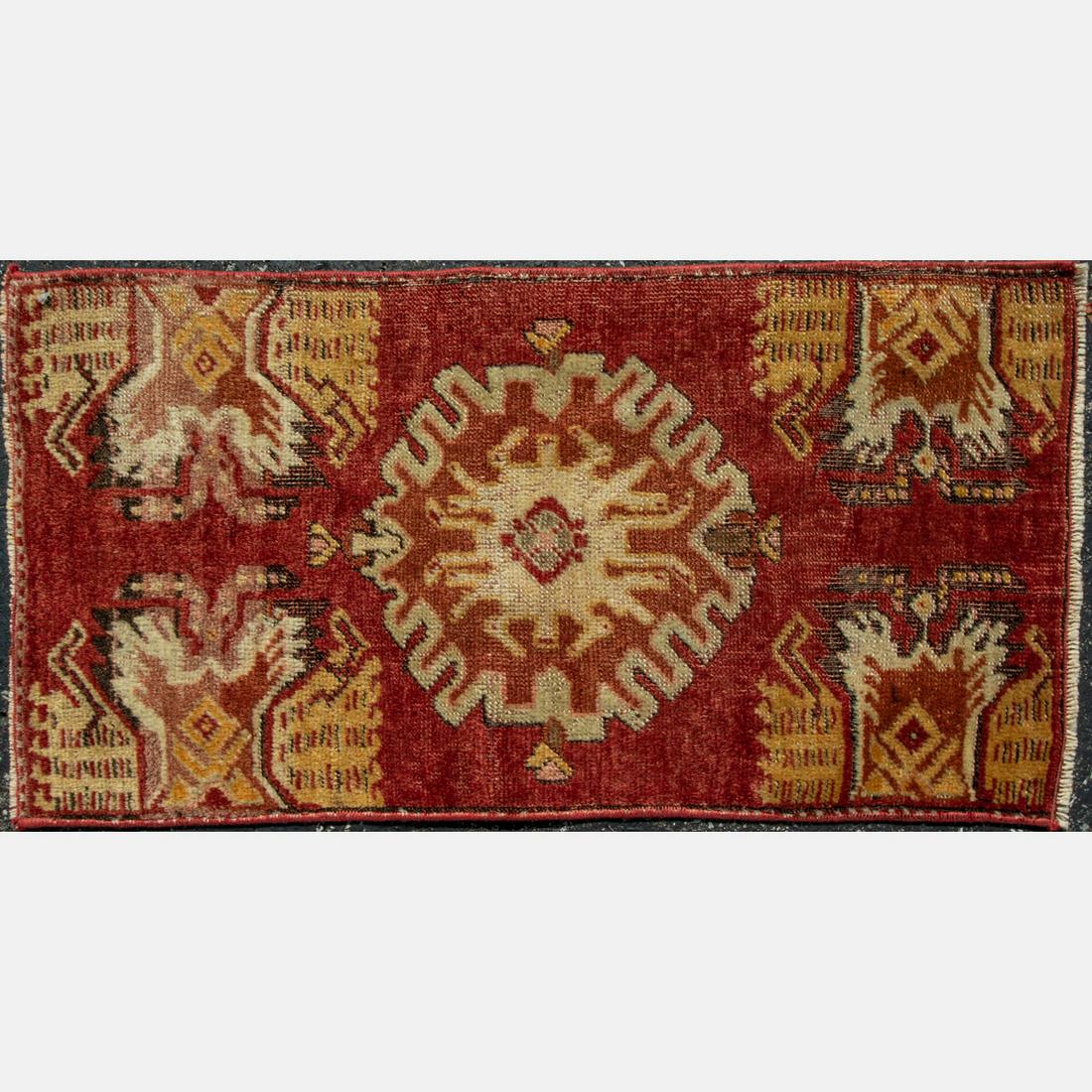 An Antique Turkish Village Wool Rug, Early 20th: An Antique Turkish Village Wool Rug, Early 20th Century. Dimensions: 2 ft. 7 in. x 1 ft. 4 in.