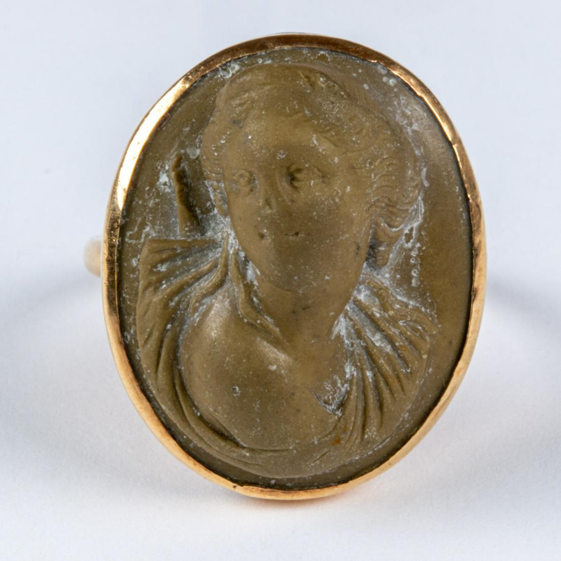 A 14kt and 10kt Yellow Gold Cameo Ring.: A 14kt and 10kt Yellow Gold Cameo Ring.Ring size: 6Total approx. weight: 4.5 dwt.Please note no credit card payments for first time buyers and seven business day hold on all checks.